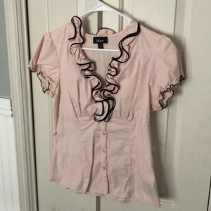 Pink ruffled blouse